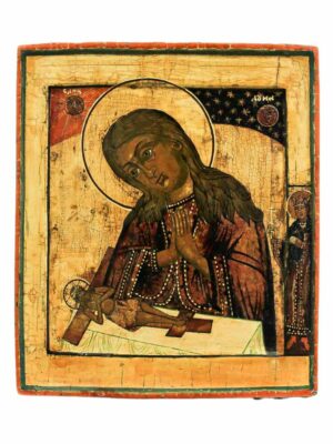 La raffigurazione presenta un'insolita rappresentazione della Vergine, con le mani congiunte in preghiera.. Volge lo sguardo verso il Cristo crocifisso.